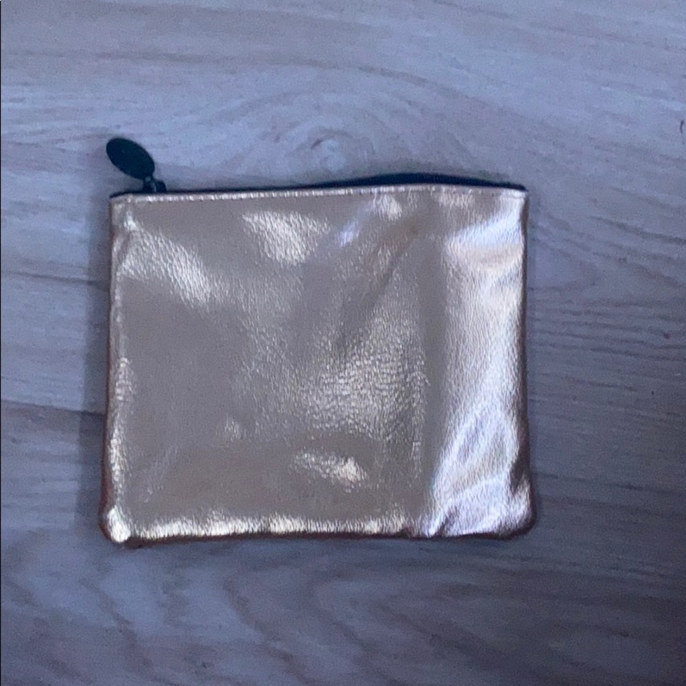 gold and black makeup bag